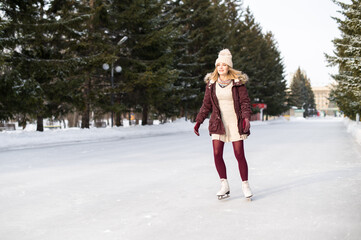 Beautiful girl having fun in winter park