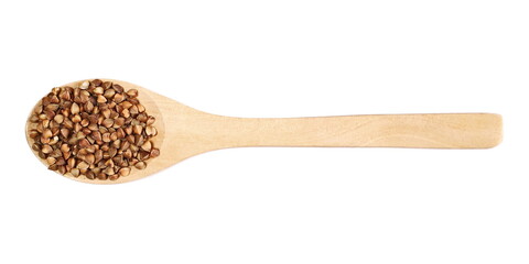 Buckwheat pile in wooden spoon isolated on white background, top view