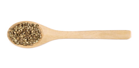 Hemp seeds with wooden spoon isolated on white background, top view