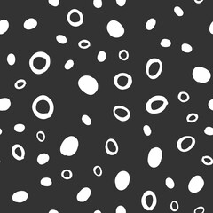 Doodle dots seamless pattern. Hand drawn circles background. Monochrome texture.