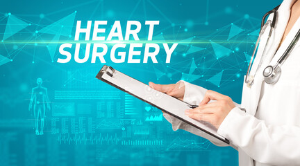 doctor writes notes on the clipboard with HEART SURGERY inscription, medical diagnosis concept