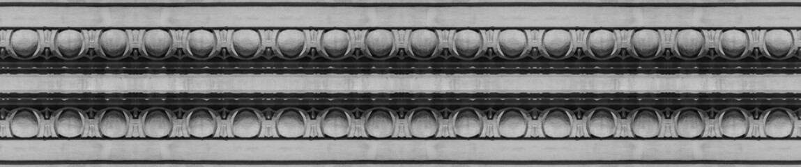 Elements of architectural decoration of buildings, plaster stucco, wall texture, plaster molding and patterns. On the streets in Barcelona, public places. © Kozlik_mozlik