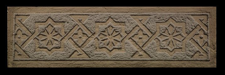 Elements of architectural decorations of buildings, gypsum stucco, wall texture, plaster molding and patterns. On the streets in Catalonia, public places. © Kozlik_mozlik