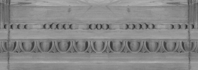 Elements of architectural decoration of buildings, plaster stucco, wall texture, plaster molding and patterns. On the streets in Barcelona, public places. © Kozlik_mozlik