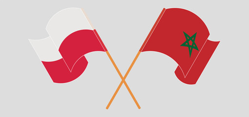 Crossed and waving flags of Poland and Morocco