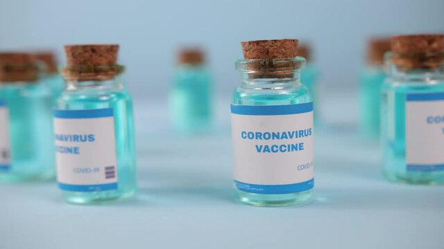 Coronavirus medication. Coronavirus covid-19 vaccine. A glass vial of the covid-19 vaccine. Hypodermic injection dose for prevention immune treatment illness virus disease.