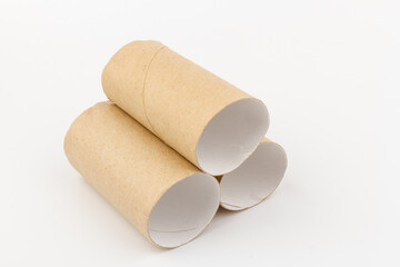 empty paper toilet rolls on white background