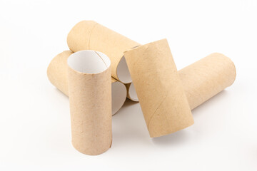 empty paper toilet rolls on white background