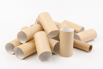 empty paper toilet rolls on white background