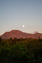 Naklejka premium Cerro Uritorco with the moon above, Cordoba, Argentina.