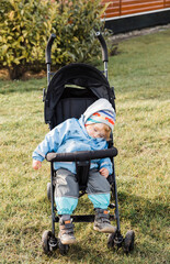 Toddler girl sleeping in stroller