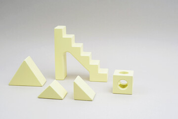 Yellow details of a wooden constructor. Popular color 2021.