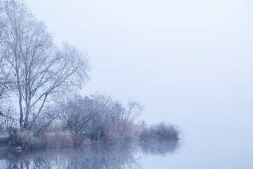 Ukraine, Kyiv - 30 November 2020: Nebrezh Lake at the frozen mist morning weather