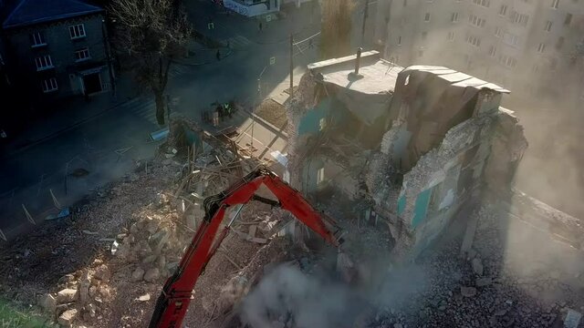 Aerial view of demolition site. Process of demolition of old industrial building