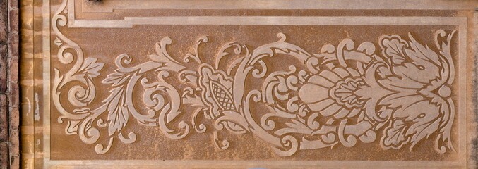 Elements of architectural decorations of buildings, gypsum stucco, wall texture, plaster molding and patterns. On the streets in Catalonia, public places. © Kozlik_mozlik