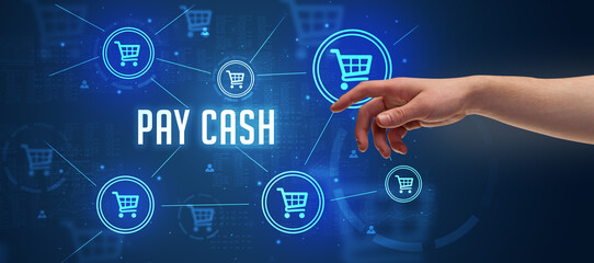 Close-Up of cropped hand pointing at PAY CASH inscription, online shopping concept