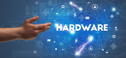 Hand pointing at HARDWARE inscription, modern technology concept