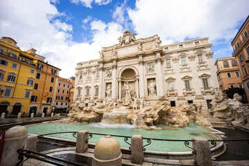 Fototapeta na wymiar Trevi Fountain, Fontana di Trevi in ​​Rome. The Trevi Fountain is the largest Baroque fountain, it is one of the most famous symbols of Rome. Rare shots in lockdown with empty square. 