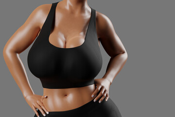 Young slim woman with big breasts in black sportswear