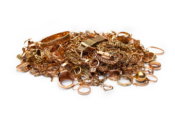 Scrap gold jewelry. Pile of old used gold jewelry on white background.