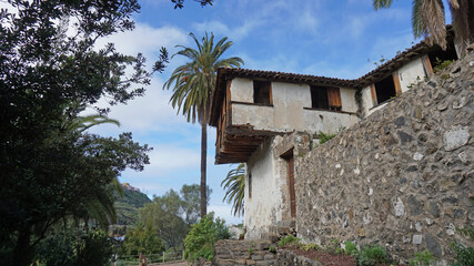 Fototapeta na wymiar An old rustic house with a tropical garden in Icod de Los Vinos, Tenerife, Canary Islands, Spain 