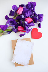 Happy Valentine's Day greeting card. beautiful bouquet of flowers, red heart and space for text