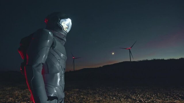 Astronaut in helmet wearing special equipment standing at the new planet, looking around while looking for a new home and traveling on other planets to find a place for humanity. Spaceman concept