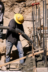 Placing pumped concrete with a large hose