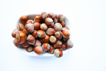 Hazelnuts isolated on the white background.Fresh Hazelnuts                          