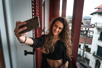 Young caucasian girl taking a selfie