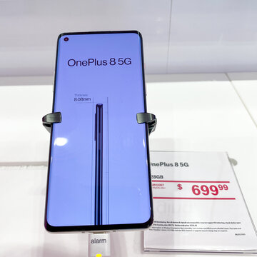 The latest OnePlus 8 5G cellphone on display at T Mobile.
