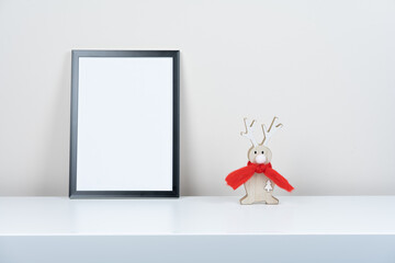 reindeer figurine and frame 