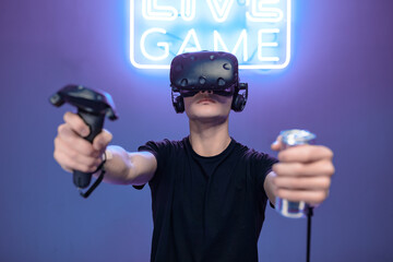 Man playing games and drinking energy