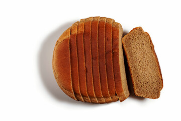 A loaf of rye bread cut into pieces.