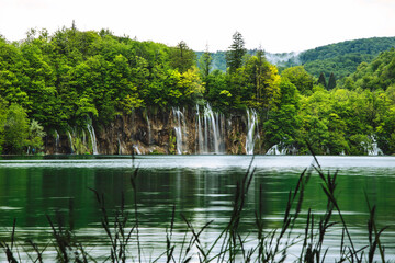 Plitvice Lakes beautiful nature, wood bridge. lakes, waterfall, rainbow, rivers.