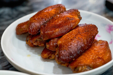 A plate of fragrant and tempting barbecue chicken wings