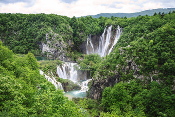Plitvice Lakes beautiful nature, wood bridge. lakes, waterfall, rainbow, rivers.