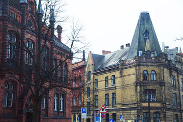 Fototapeta premium Post card view amber house in Germany Hamburg, european street and roofs