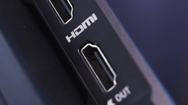 HDMI connector of a device, close up view. Action. Socket for the HDMI cable, concept of electronic technologies. 