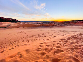 Fototapeta na wymiar Pink coral sand dunes sunset