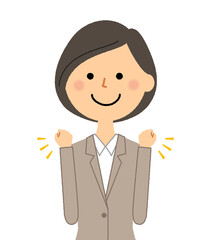 ガッツポーズをするスーツの女性