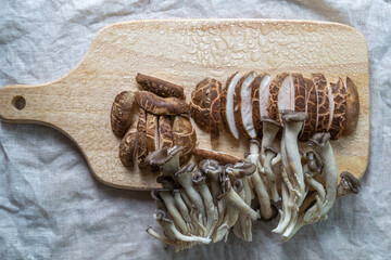 Mushrooms on a cutting board, top view