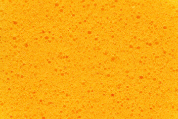 A colorful sponge texture, orange sponge background.