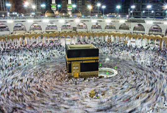 Muslim pilgrims from all around the world doing tawaf, praying around the kabah, during hajj period.