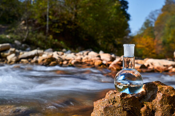 Naklejka premium Clean drinking water. Flask with water.