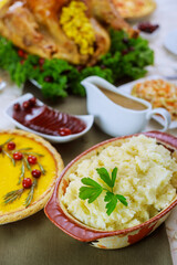 Mashed potatoes, gravy and turkey for Christmas or Thanksgiving Day.