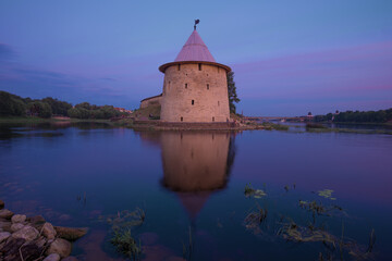 View of the Flat Tower of the Pskov Kremlin on July twilight. Russia
