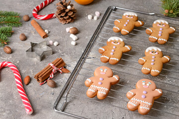 Christmas composition with gingerbread cookies on grunge background