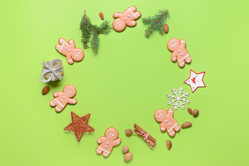 Christmas composition with gingerbread cookies on color background