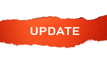 The white sheet is torn in the center by a horizontal line inside which is a red background with the inscription update. Concept photo